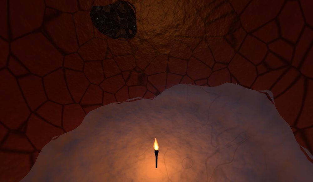 A torch lighting a dug-out room underground